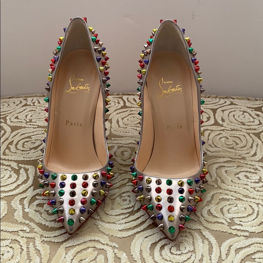 Brand New Christian Louboutin pumps size 38.